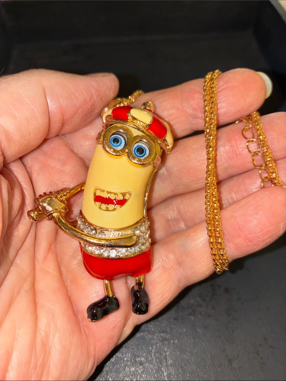 Gold-Tone Red & Cream Minion Golfer Pendant Necklace. His legs move. moveable